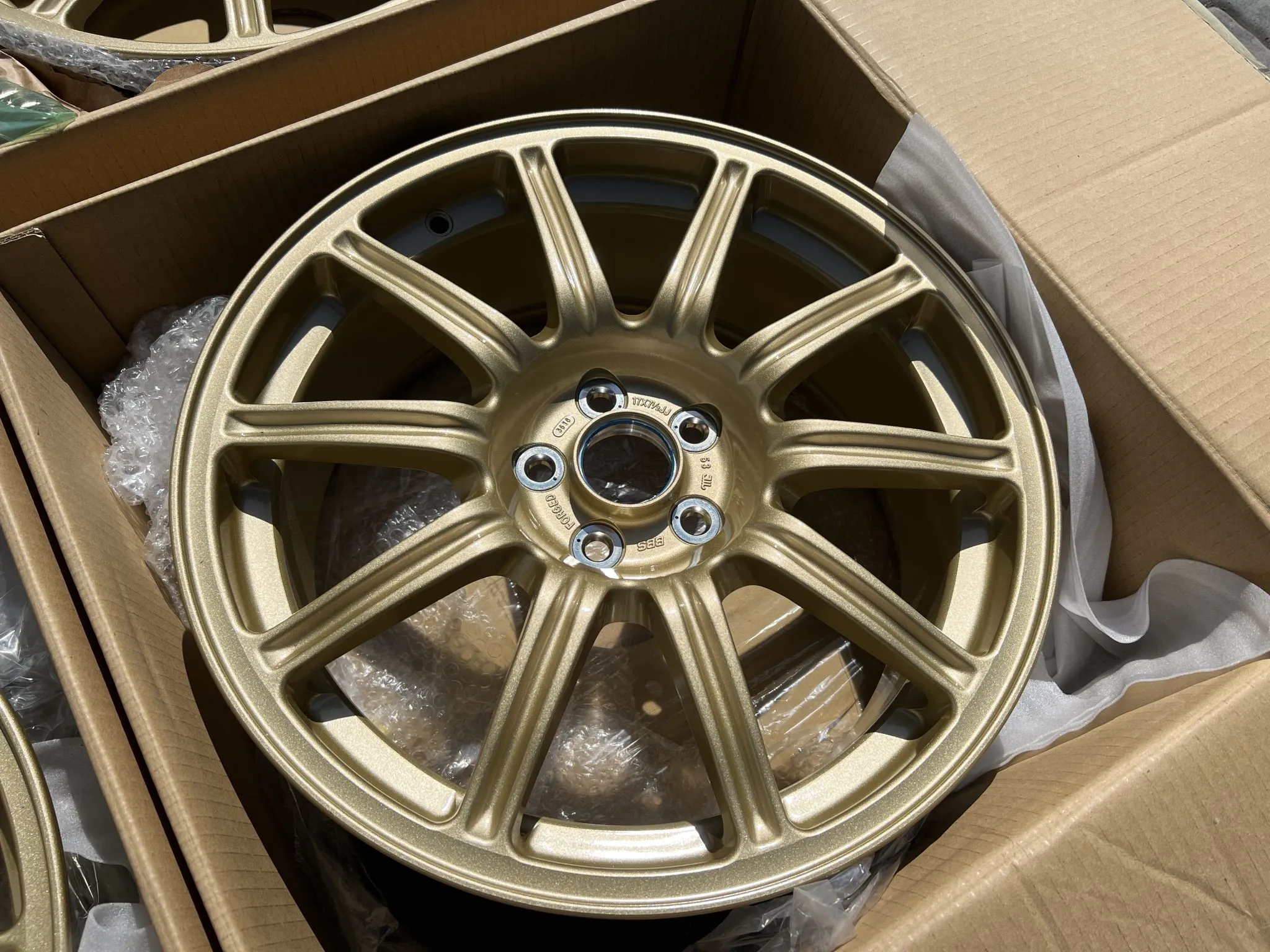 BBS wheels 17 inch forged gold Bridgestone Potenza tires set