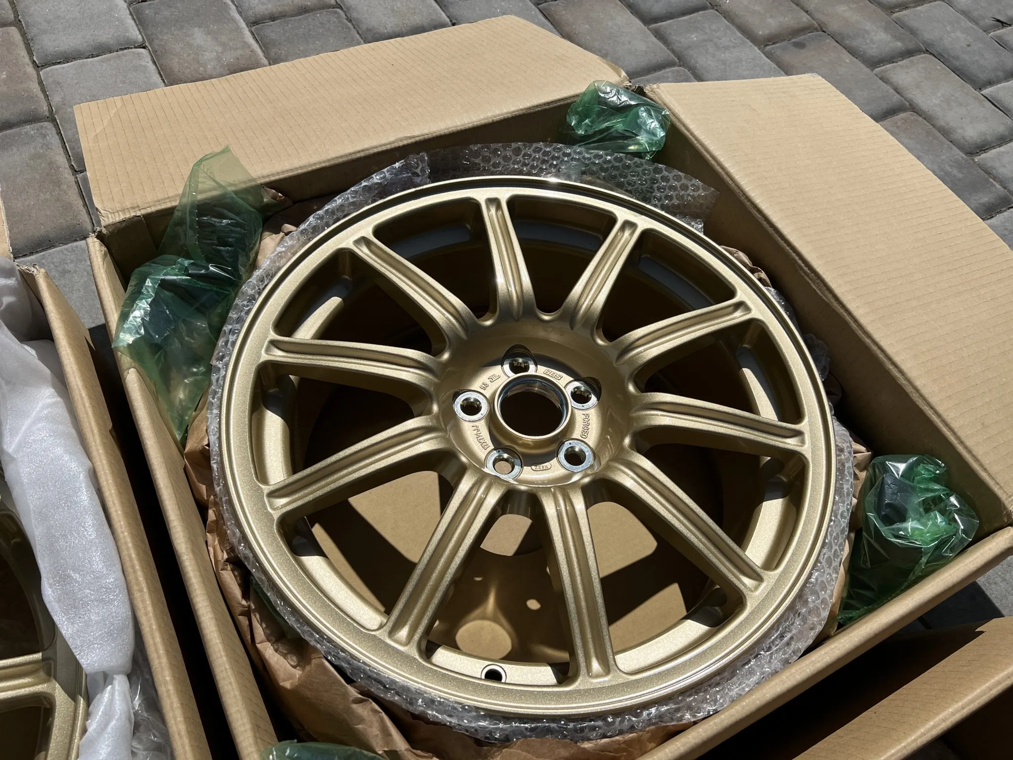 BBS wheels 17 inch forged gold Bridgestone Potenza tires set