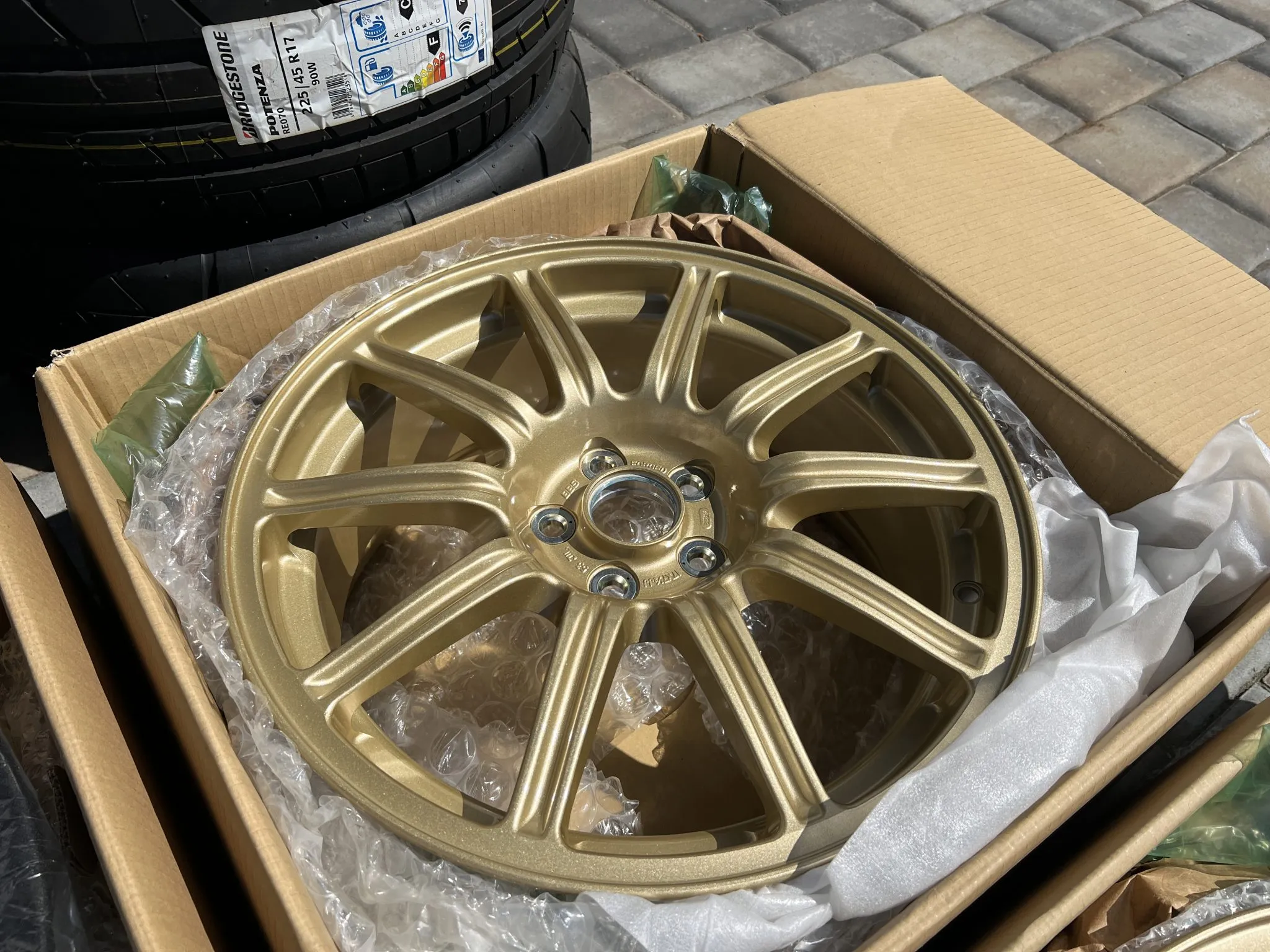 BBS wheels 17 inch forged gold Bridgestone Potenza tires set