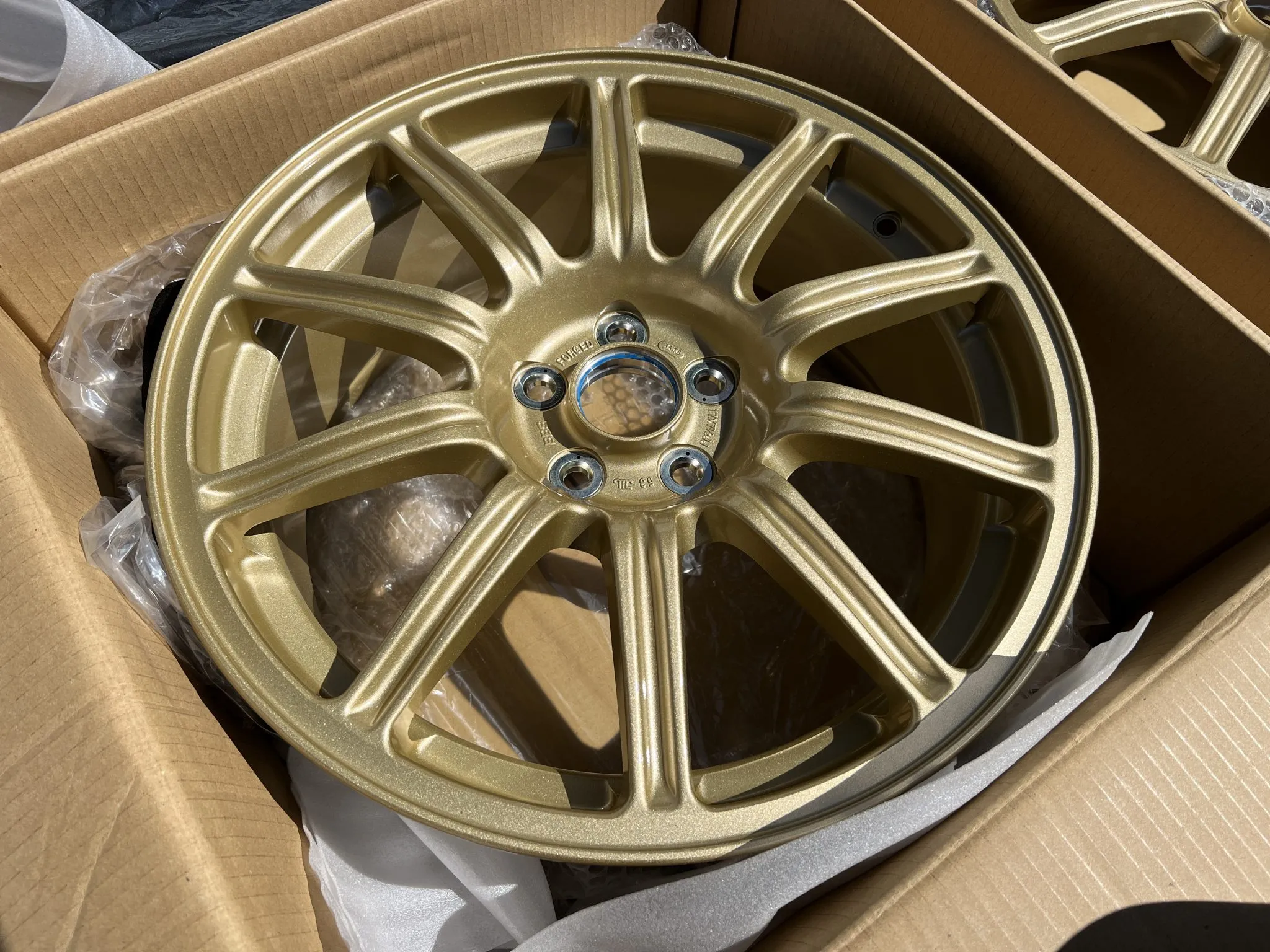 BBS wheels 17 inch forged gold Bridgestone Potenza tires set