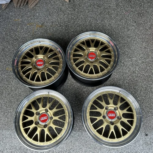BBS E88 Wheels | 18×8.5 Front / 18×10 Rear | Three-Piece | Gold with Polished Lips | Red BBS Center Caps | Porsche